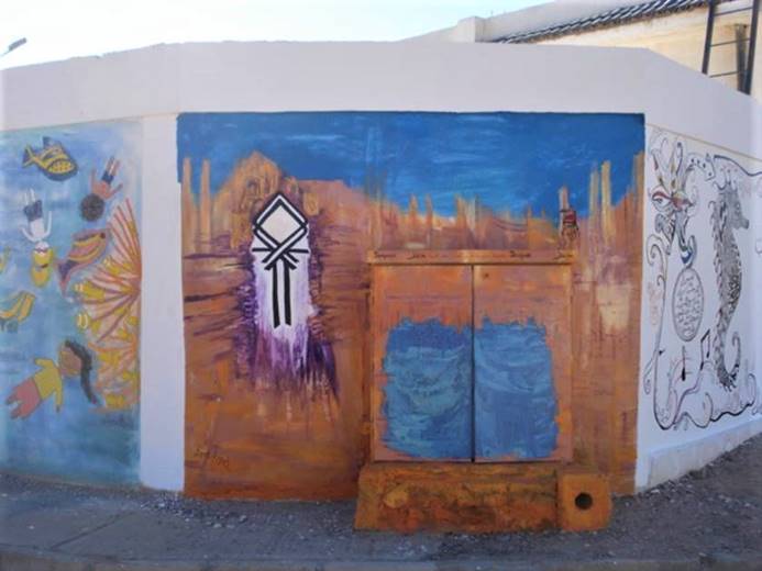 Et billede, der indeholder udendørs, bygning, graffiti, malet

Automatisk genereret beskrivelse